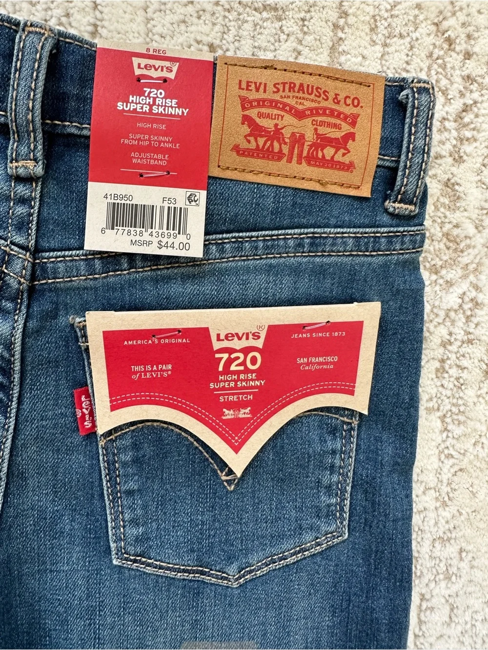 Levis 720 High Rise Super Skinny Jeans Girls 8 Blue Distressed Raw Hem